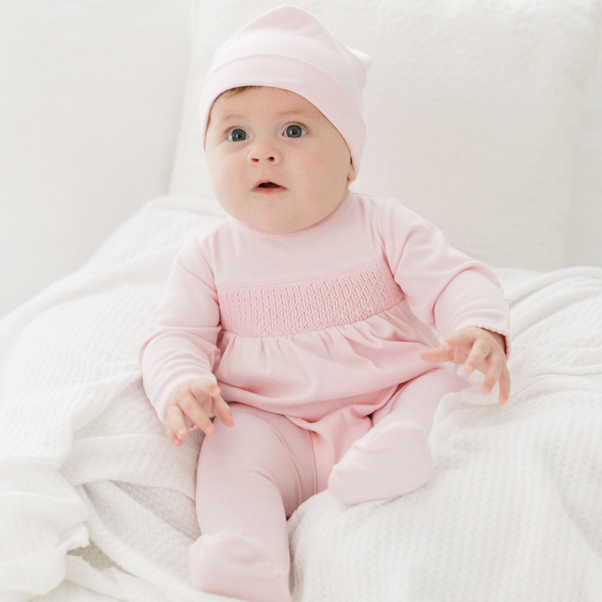 Essentials Solid Pink Smocked Footie - Magnolia BabyFootie