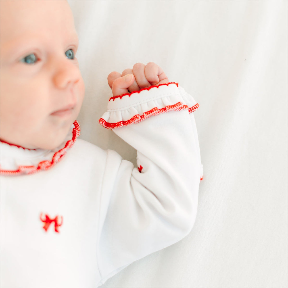 Scarlett Bows Scattered Ruffle Footie - Magnolia BabyFootie