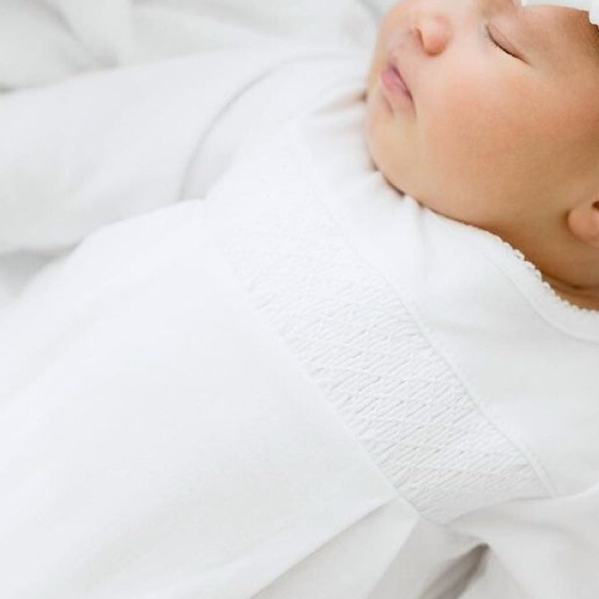 Solid Essentials White Smocked Footie - Magnolia BabyFootie