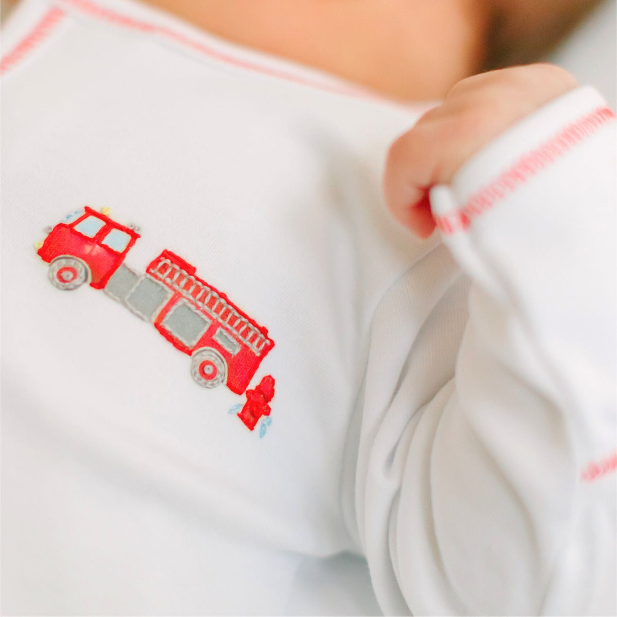 To the Rescue Embroidered Footie - Magnolia BabyFootie