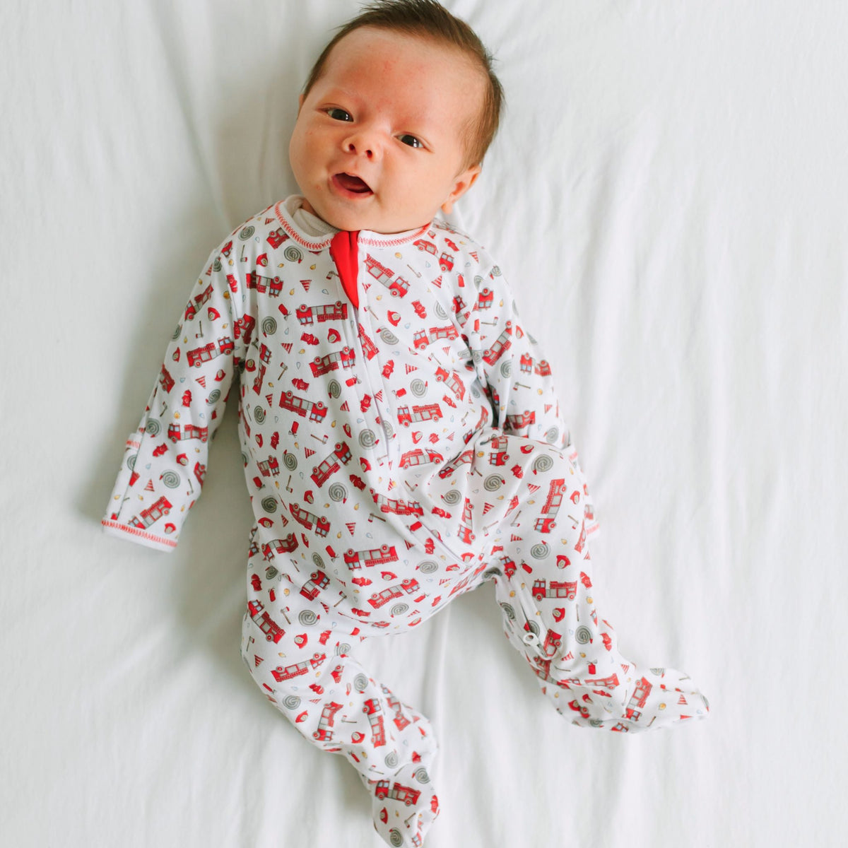 To the Rescue Print Zip Footie - Magnolia BabyFootie
